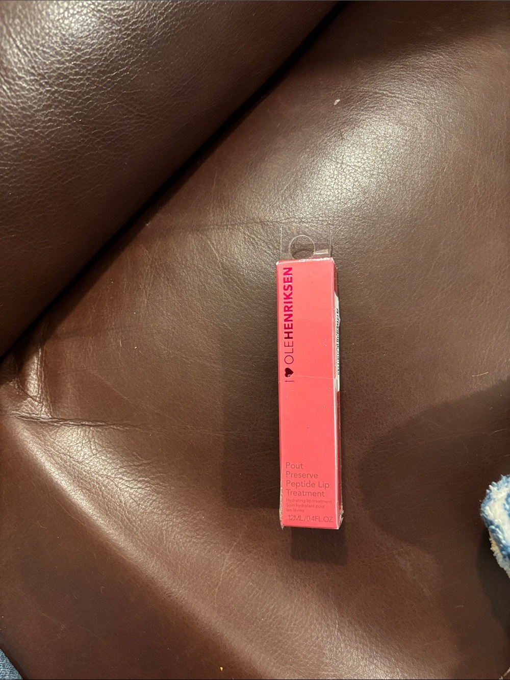 Lip treatment product on leather surface